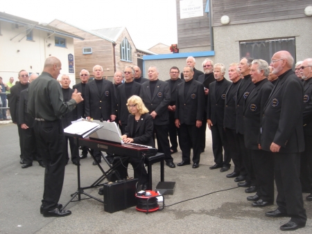 The Choir singing near the fish quay in Looe